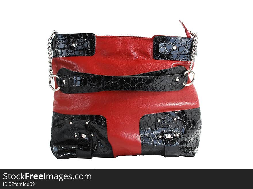 This is a beautiful black and red leather handbag isolated on a white background. This is a beautiful black and red leather handbag isolated on a white background.