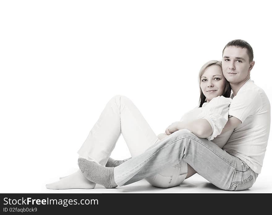 Beautiful youn couple on white. Beautiful youn couple on white