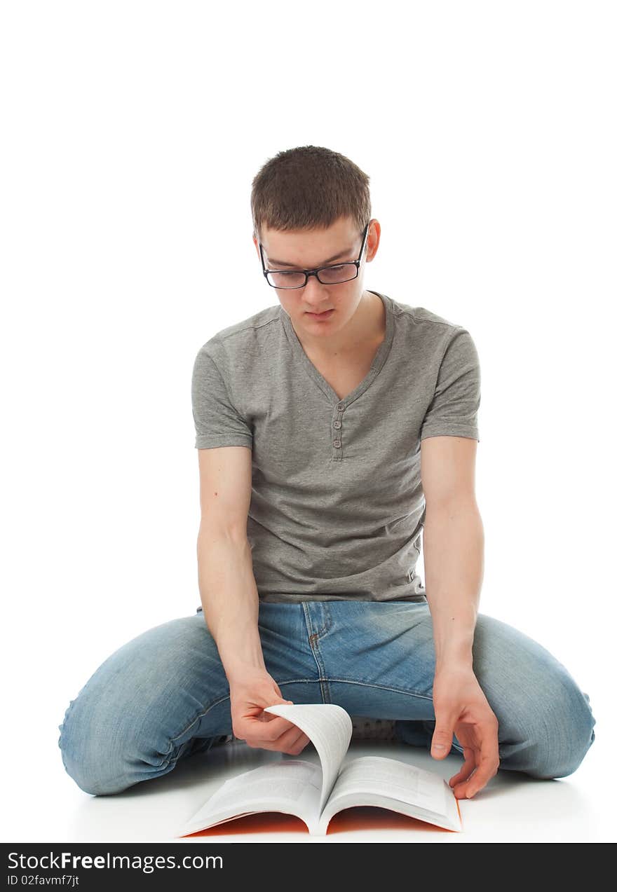 The young student with the book isolated on a white background