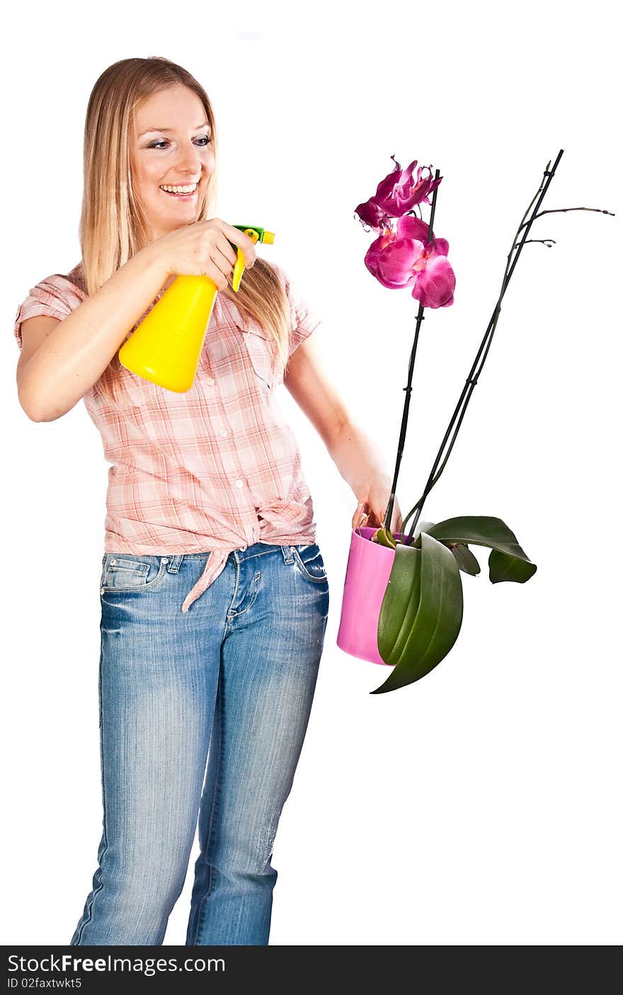 Woman watering flowers