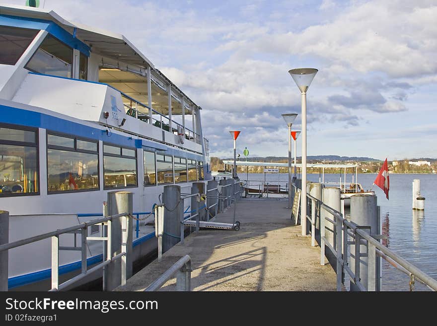 Lake quay with a boat