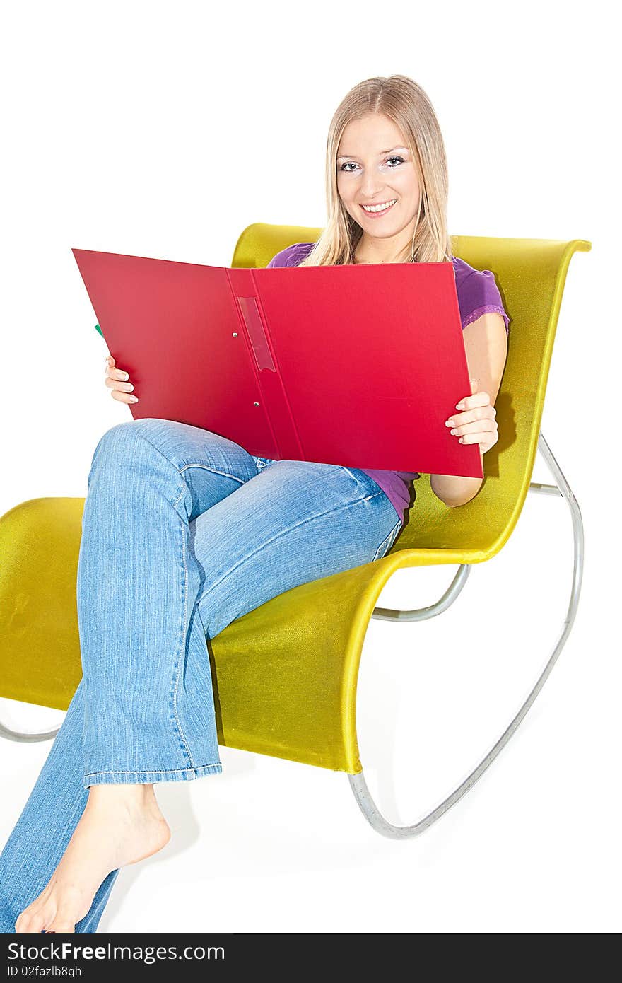 Woman on chair taking notes