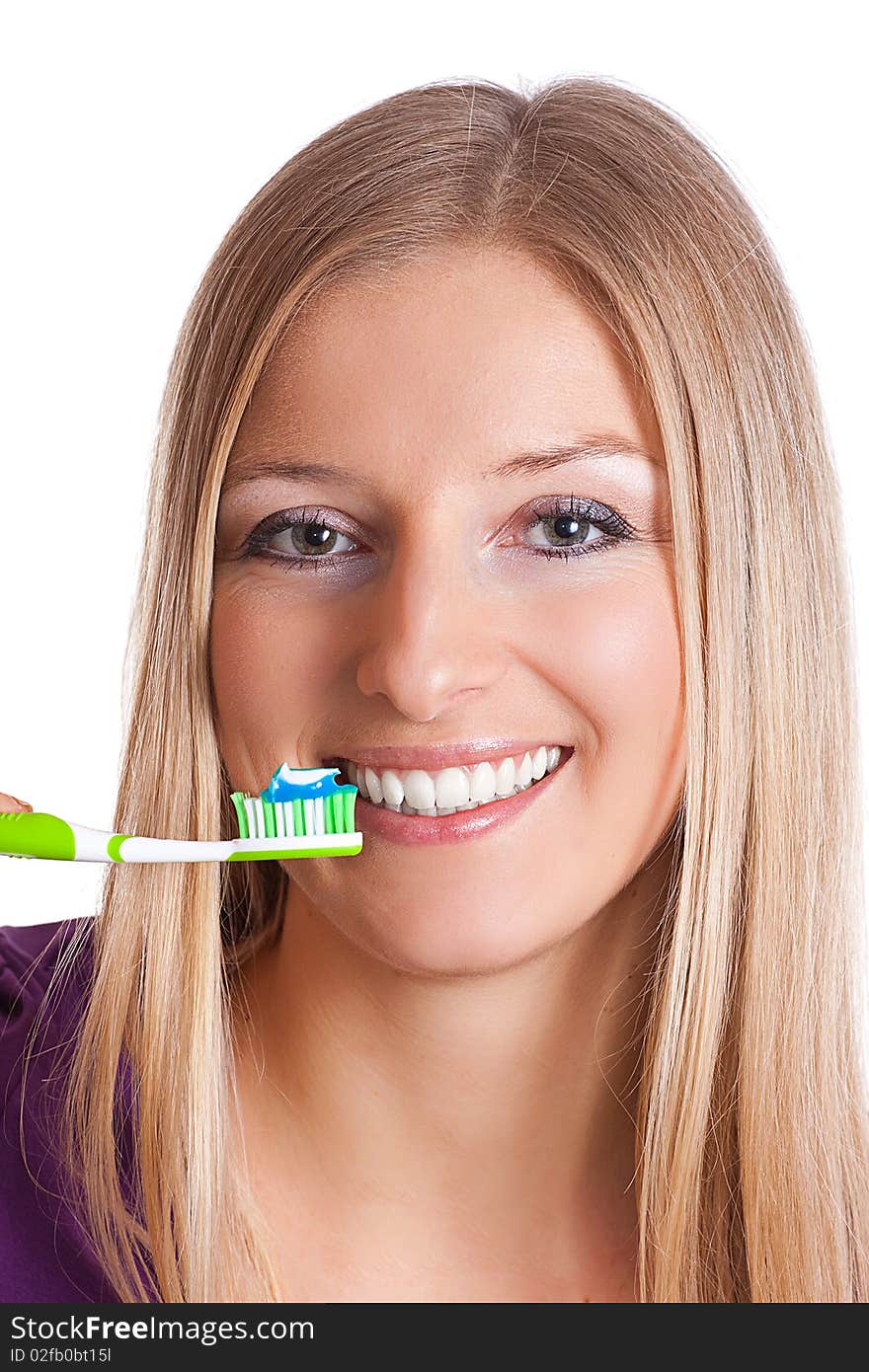 Caucasian blonde woman with toothbrush, toothpaste and healthy teeth