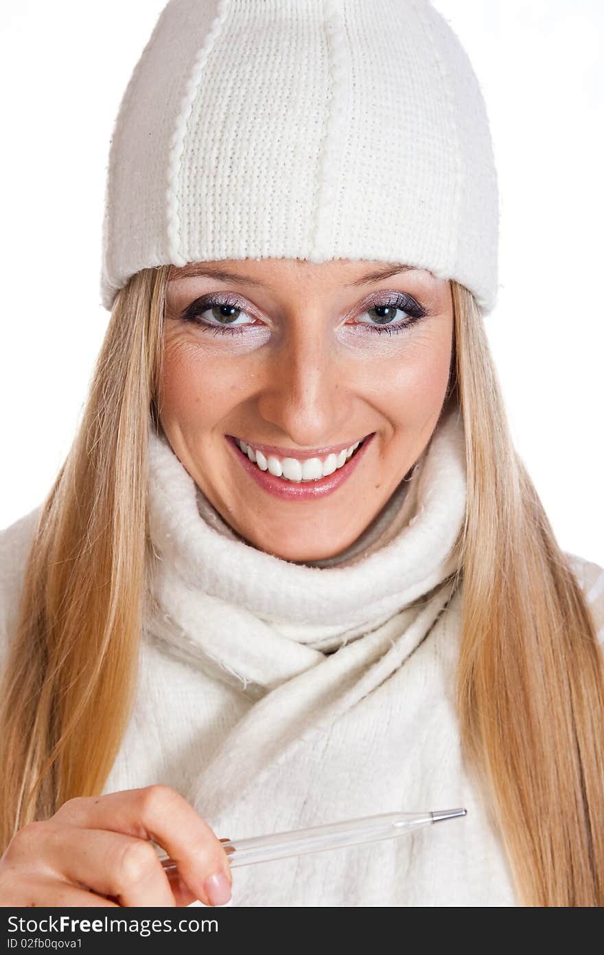 Caucasian blonde woman holding thermometer with white hat and scarf. Caucasian blonde woman holding thermometer with white hat and scarf