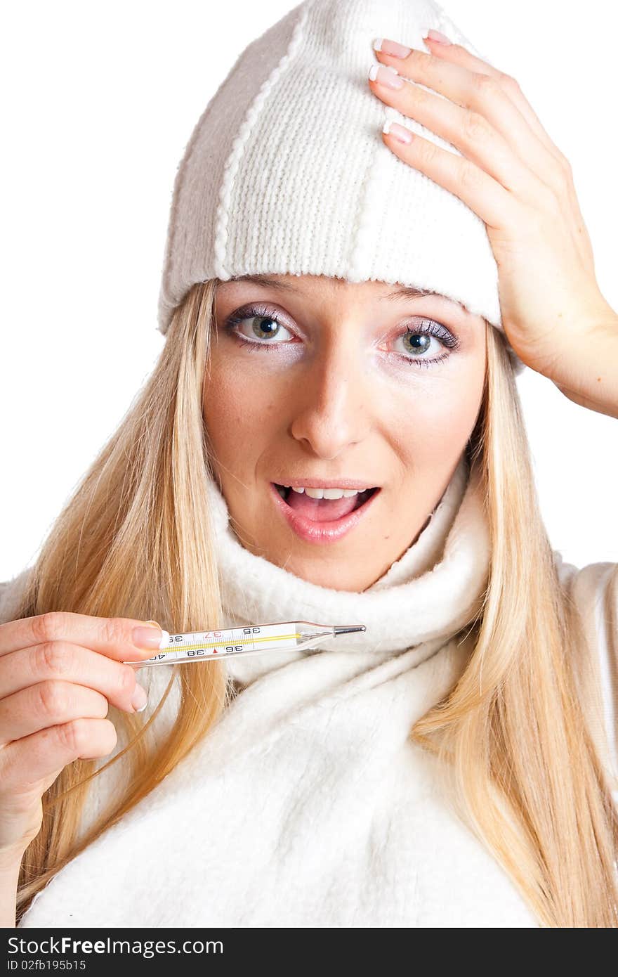 Caucasian blonde woman holding thermometer with white hat and scarf. Caucasian blonde woman holding thermometer with white hat and scarf