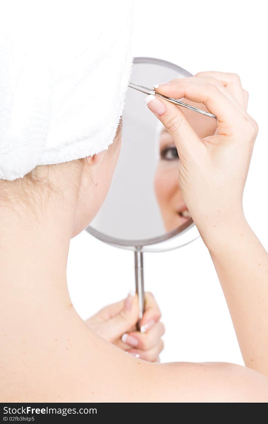 Woman makeup in mirror