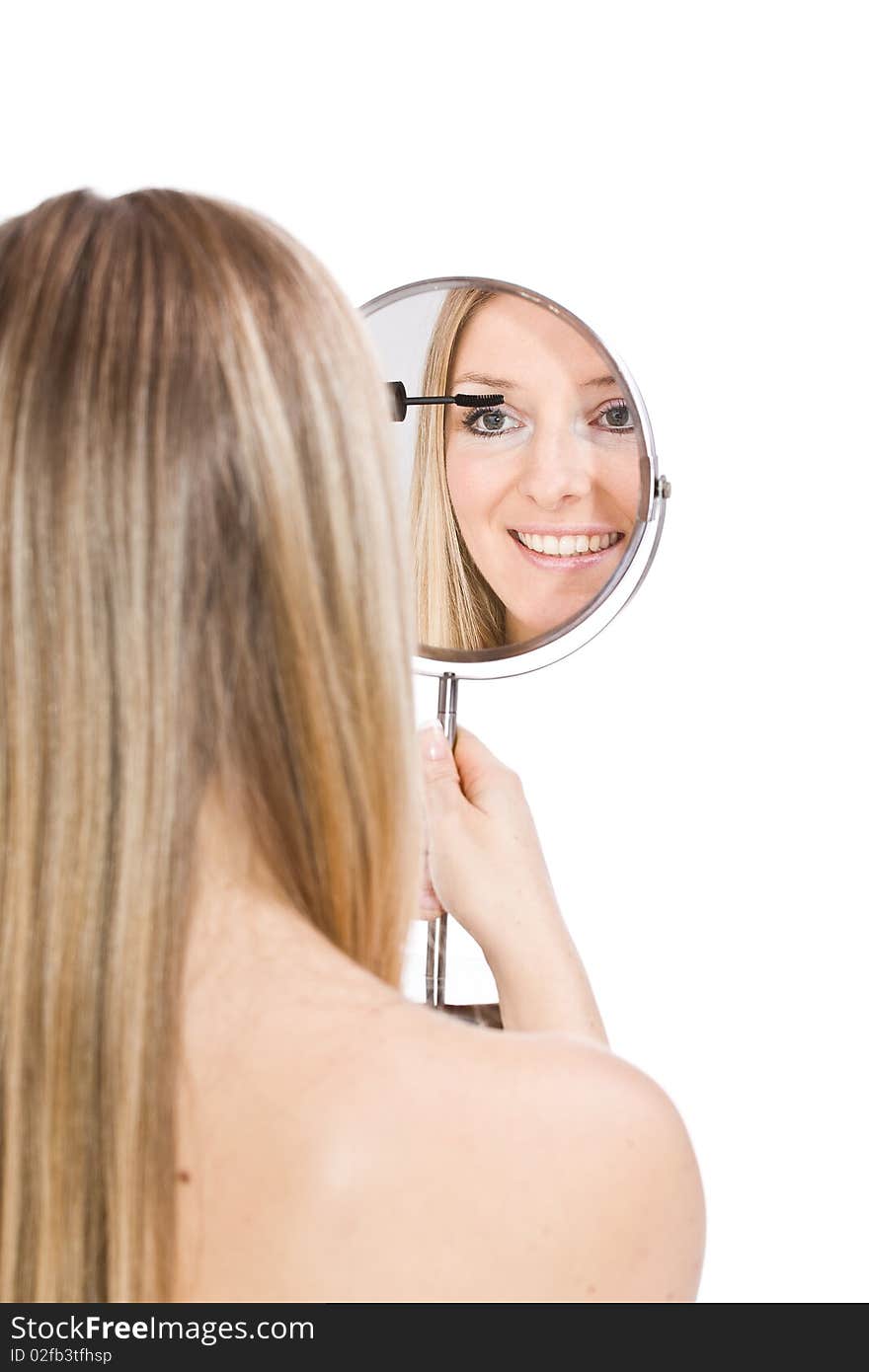 Woman makeup in mirror reflection on isolated background