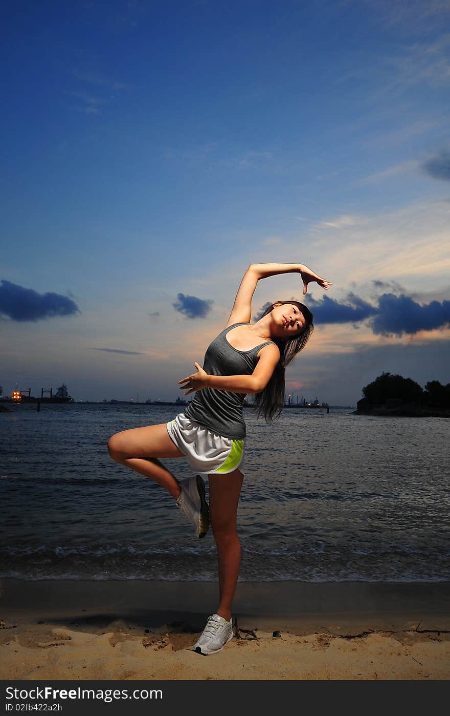 Asian Chinese Girl Practising Ballet during sunset. Useful for showing, musical, artistic type of pictures