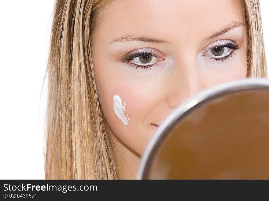 Woman makeup in mirror reflection on isolated background