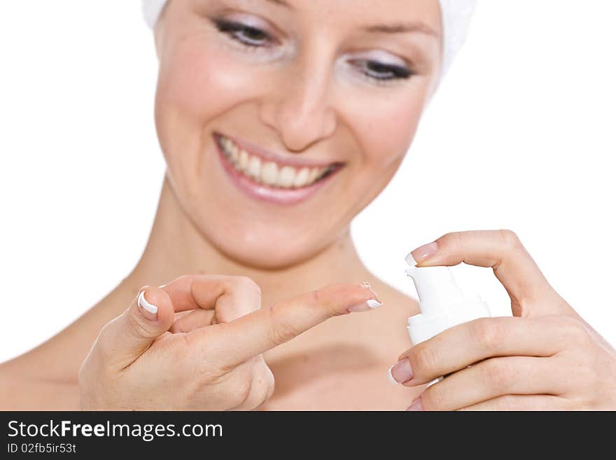 Woman creaming hands on isolated background closeup on hands. Woman creaming hands on isolated background closeup on hands