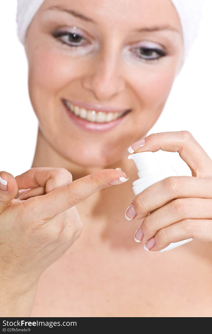 Woman creaming hands on isolated background closeup on hands. Woman creaming hands on isolated background closeup on hands