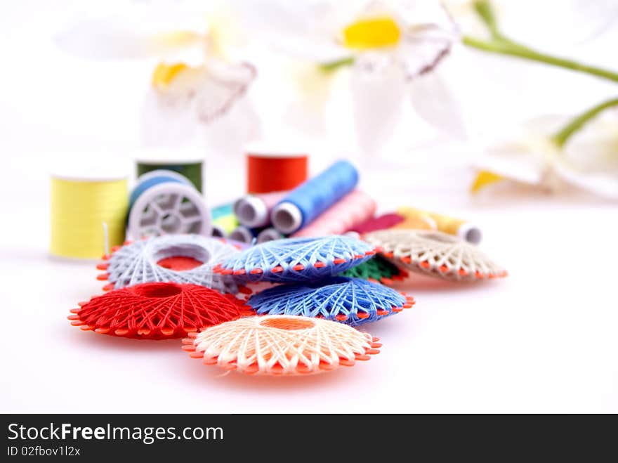 Colored spools of thread to sew