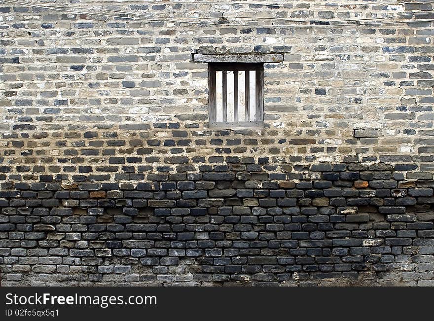 The old brick walls and window. The old brick walls and window