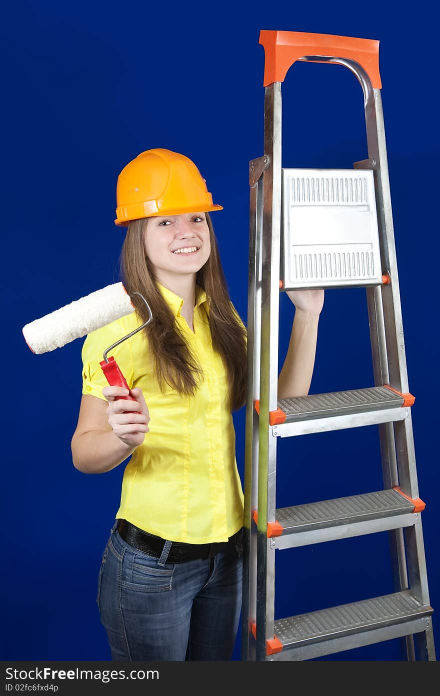 Female house painters with paint rollers and scaling-ladder