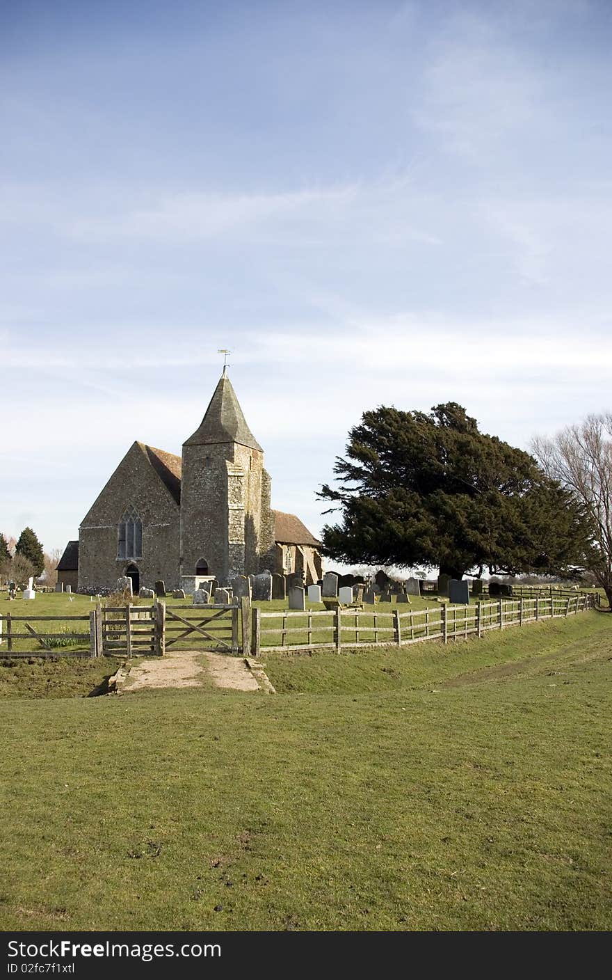 St Clements Church on Romney marsh in the Kent village of Old Rmney England. St Clements Church on Romney marsh in the Kent village of Old Rmney England.