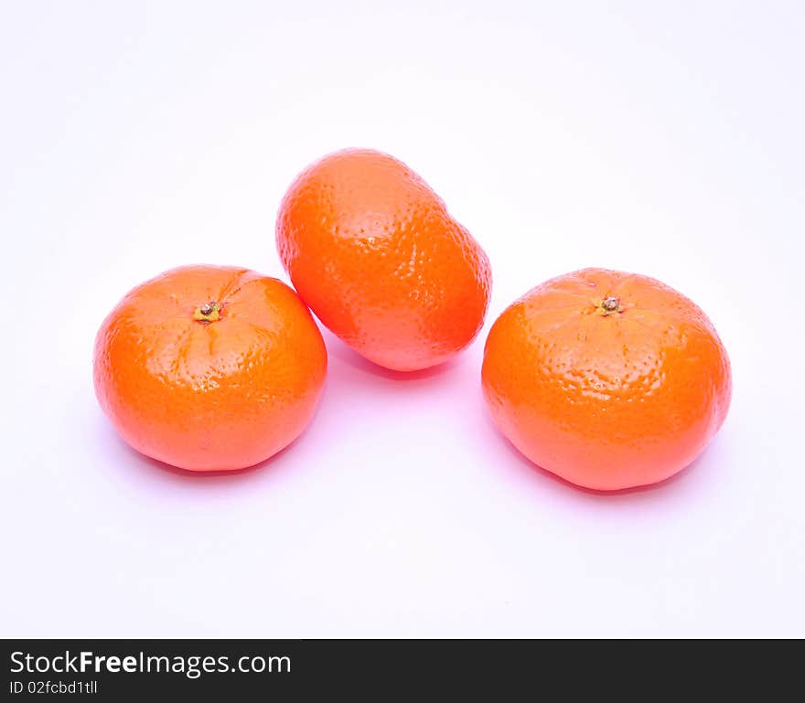 Juicy tangerines on white background