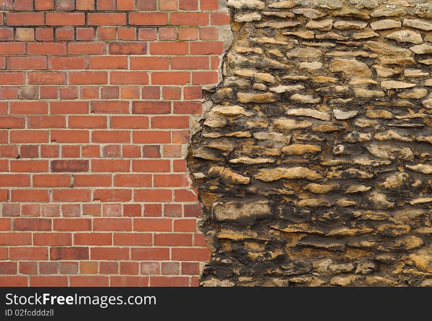 Wall from old stones and new bricks. Wall from old stones and new bricks