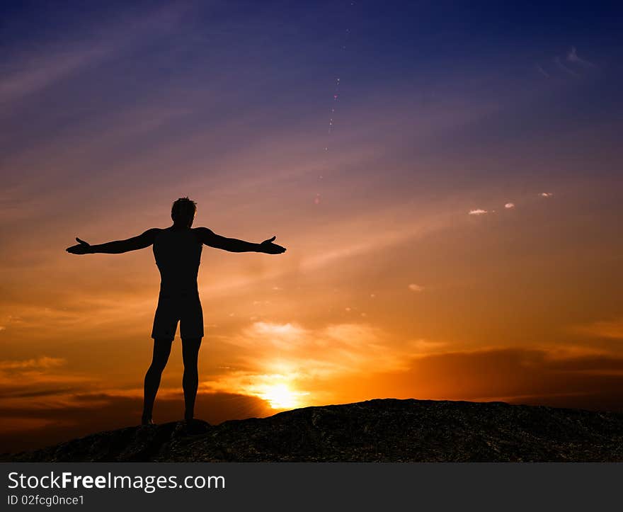 Silhouette the man on a background of the sky. Silhouette the man on a background of the sky