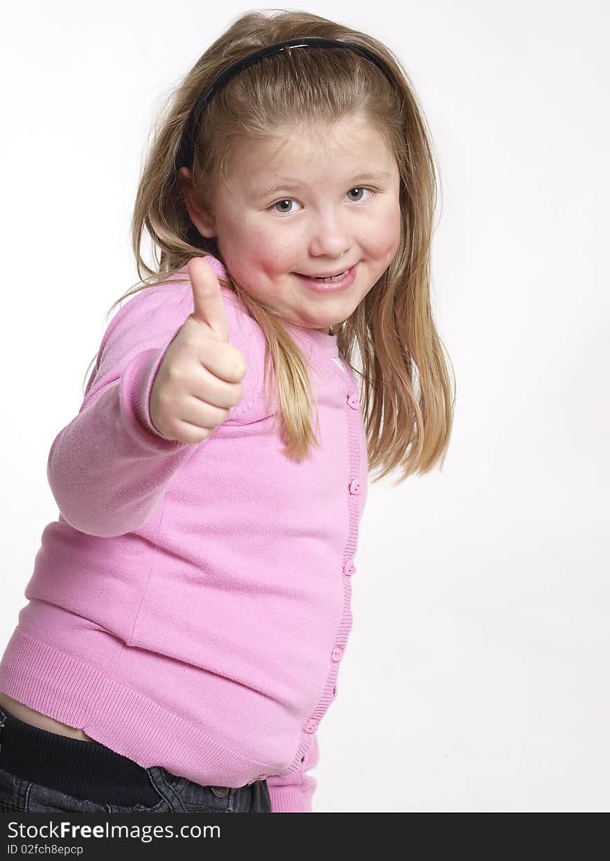 Little girl with her thumbs up