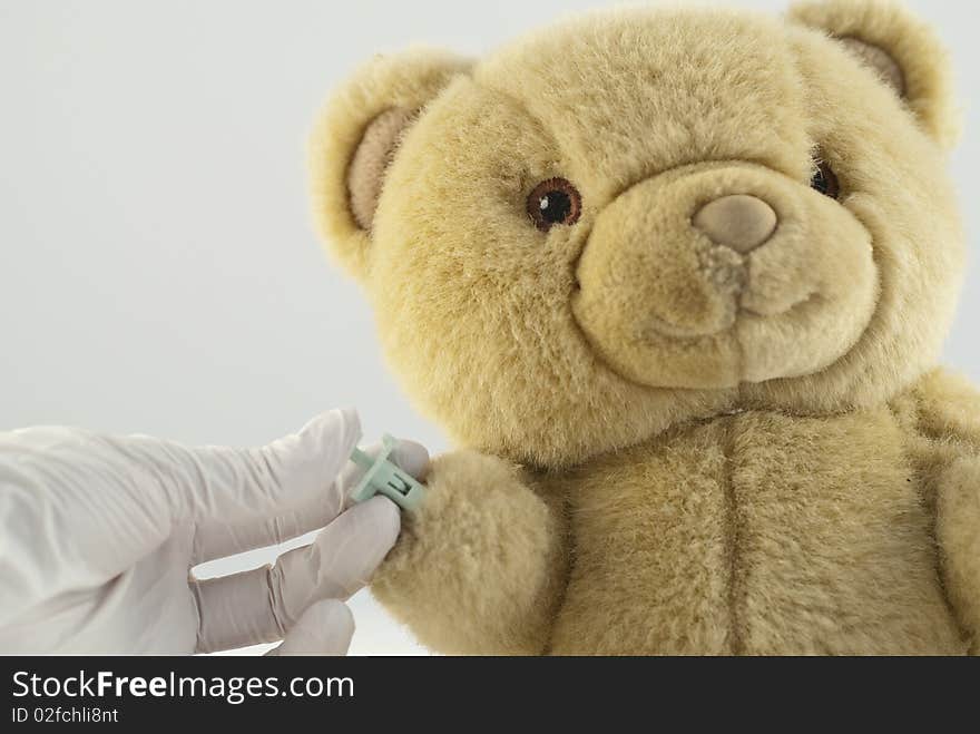 A capillary blood test on a teddy bear. A capillary blood test on a teddy bear.