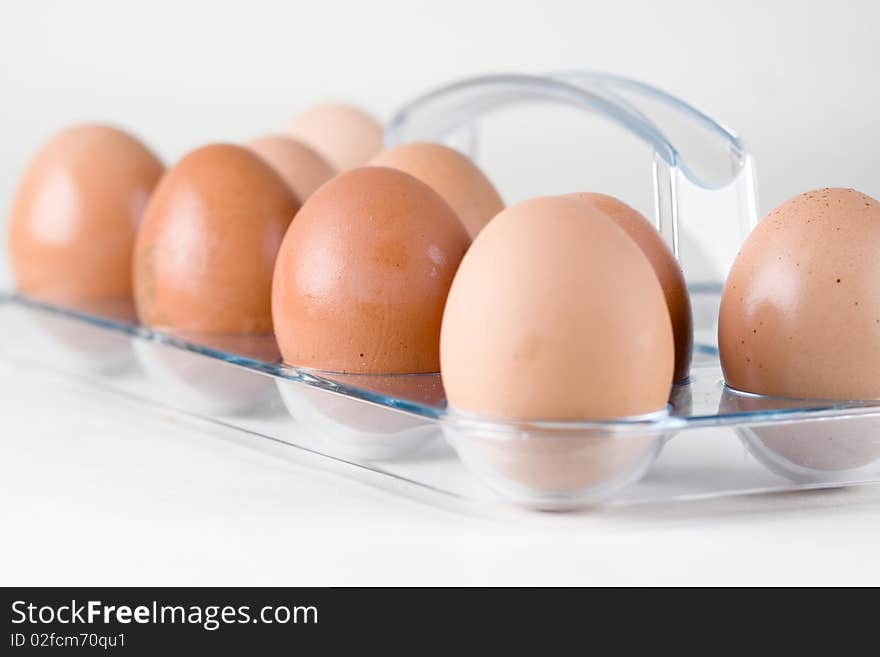 9 brown eggs isolated on the white background. 9 brown eggs isolated on the white background