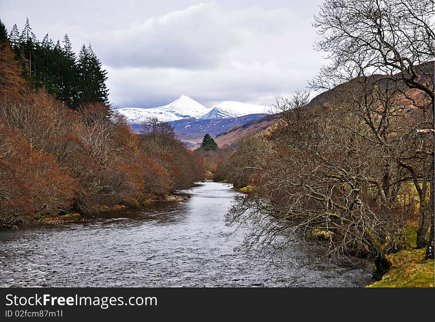 River framed by mountains, Scottish highlands. River framed by mountains, Scottish highlands