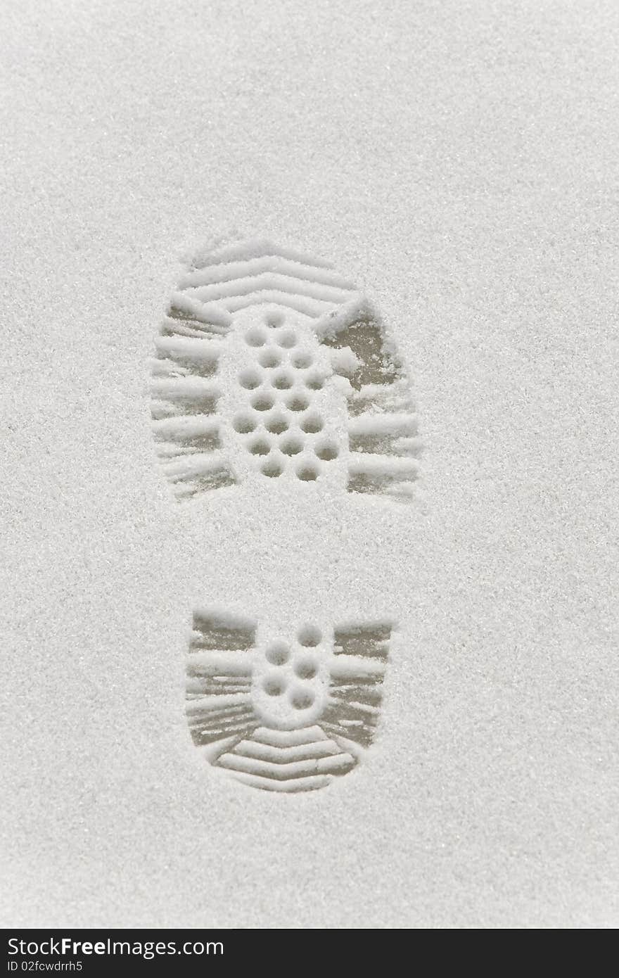 A footprint on the snow