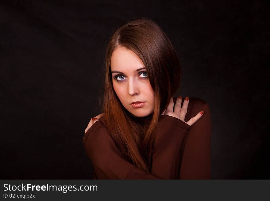 The girl with long hair. Studio shot. The girl with long hair. Studio shot