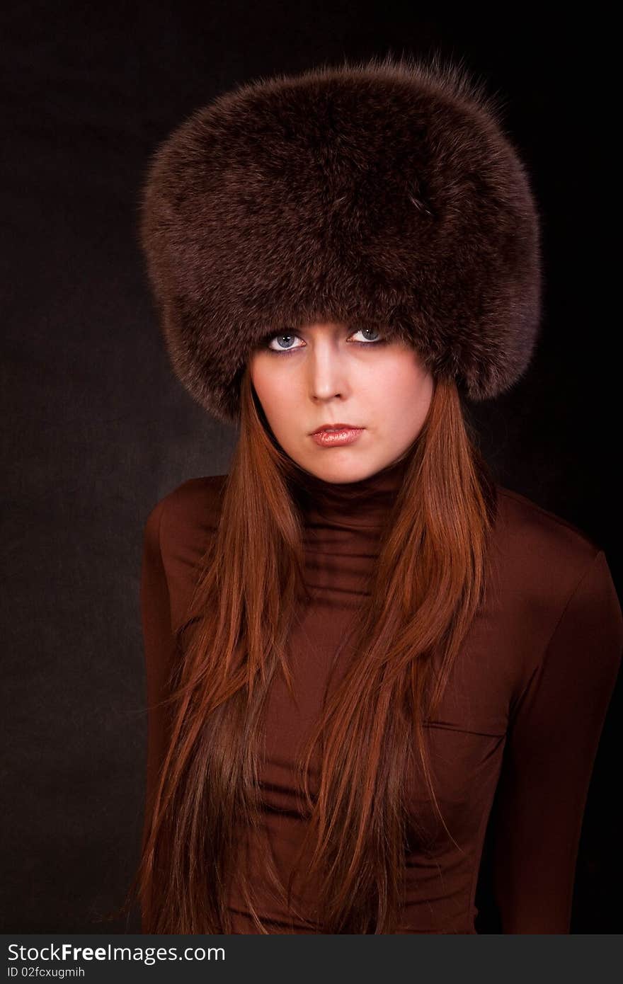 The girl in a fur cap. The girl in a fur cap