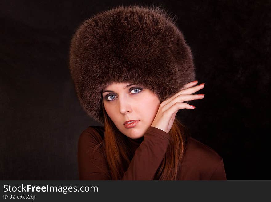 The girl in a fur cap. The girl in a fur cap