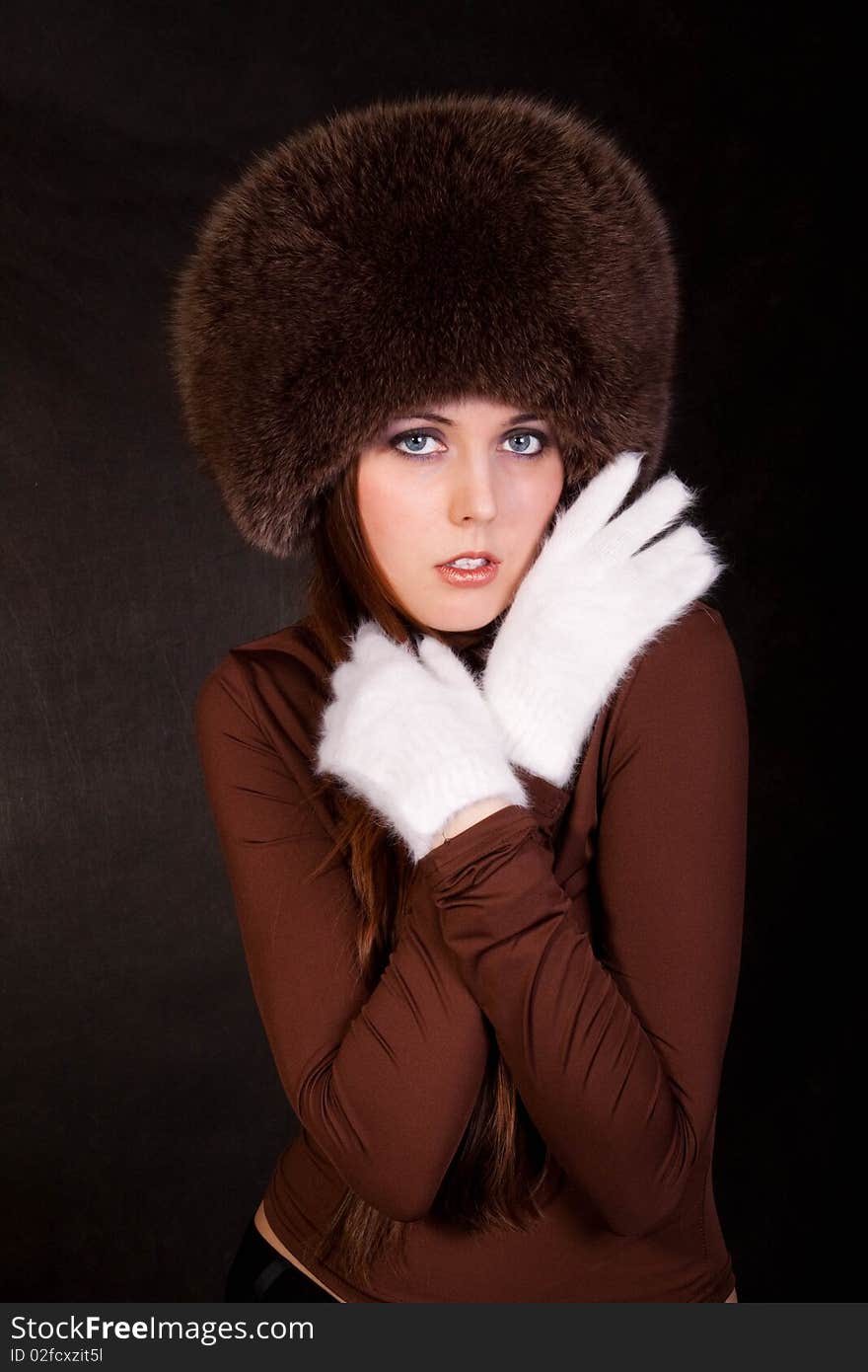 The girl in a fur cap. The girl in a fur cap