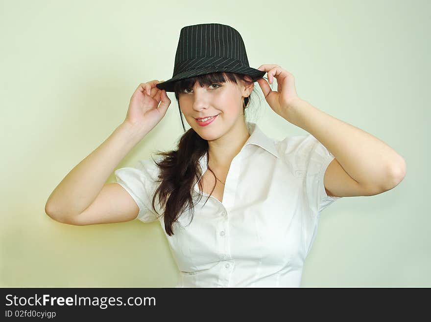 Young woman wearing black hat. Young woman wearing black hat