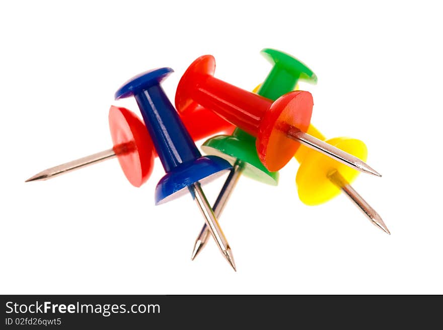 Pile of push pins on white background