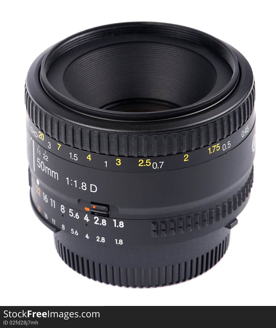 Close-up of camera lens. A basic 50mm SLR DSLR lens. Isolated on white background.