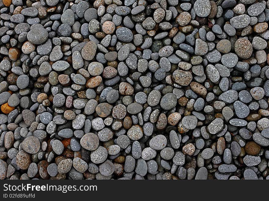 River stones for the wall material or home material.