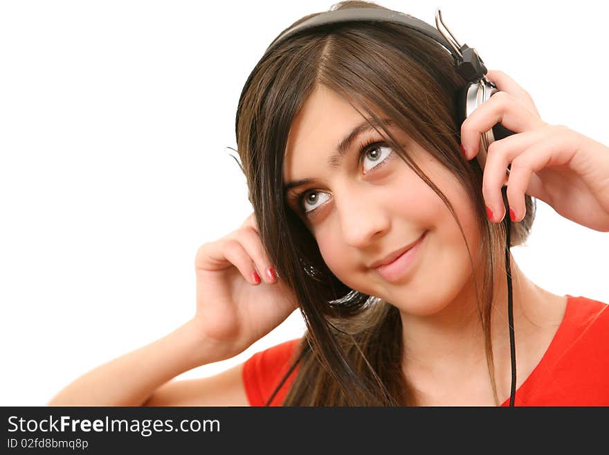 The girl in headphones on a white background