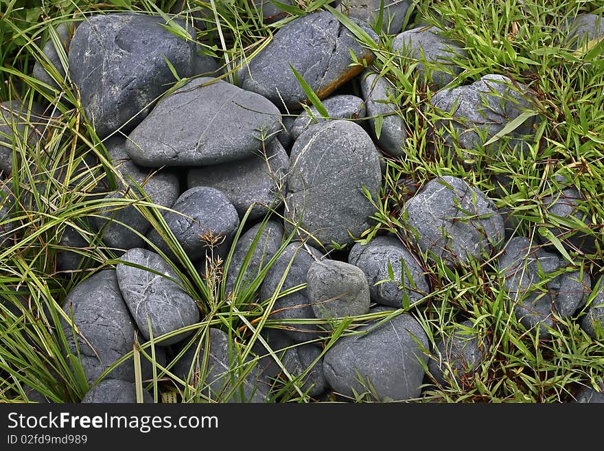 River stones for the wall material or home material.