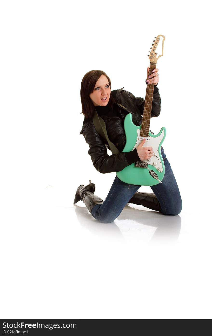 Photo of woman with leather jacket and electronic guitar. Photo of woman with leather jacket and electronic guitar