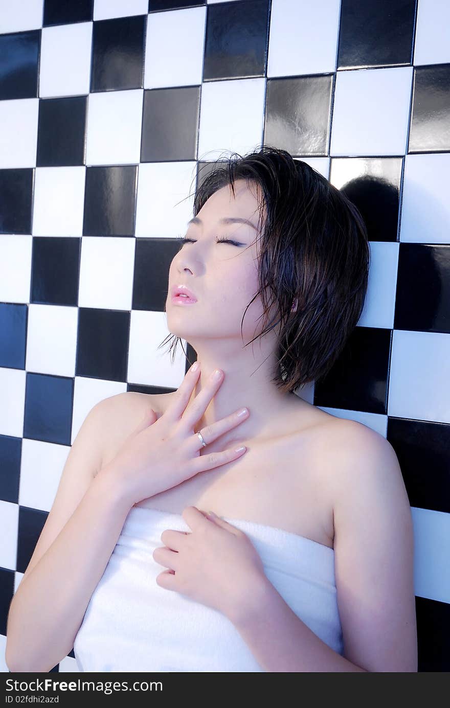 Asian girl on checkered background