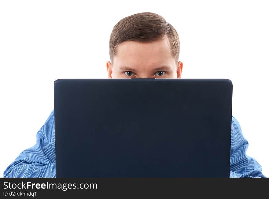 A young man using his laptop isolated on a white background