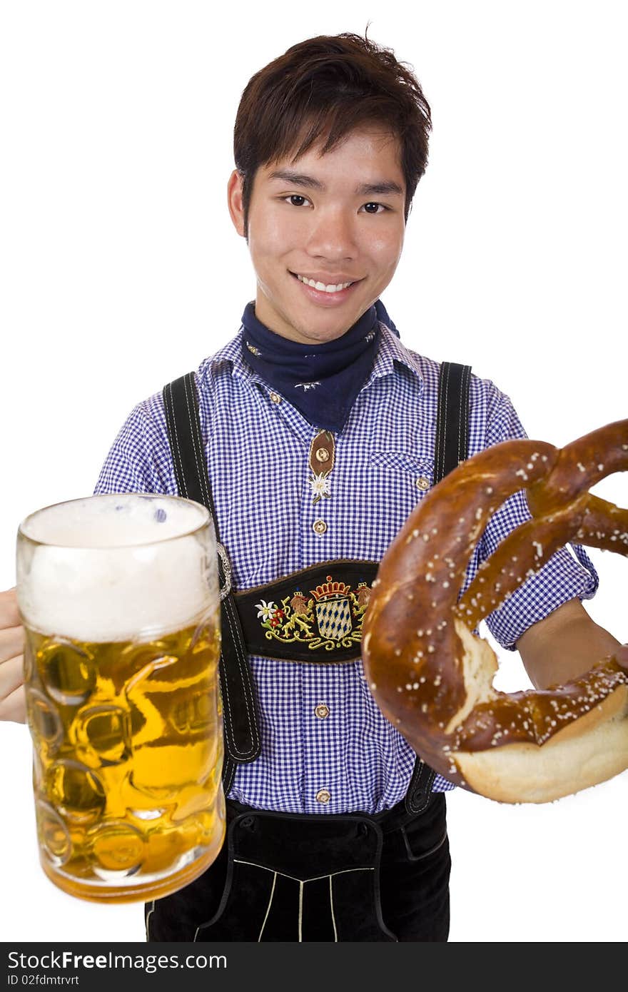 Man holds Oktoberfest beer stein and Pretzel