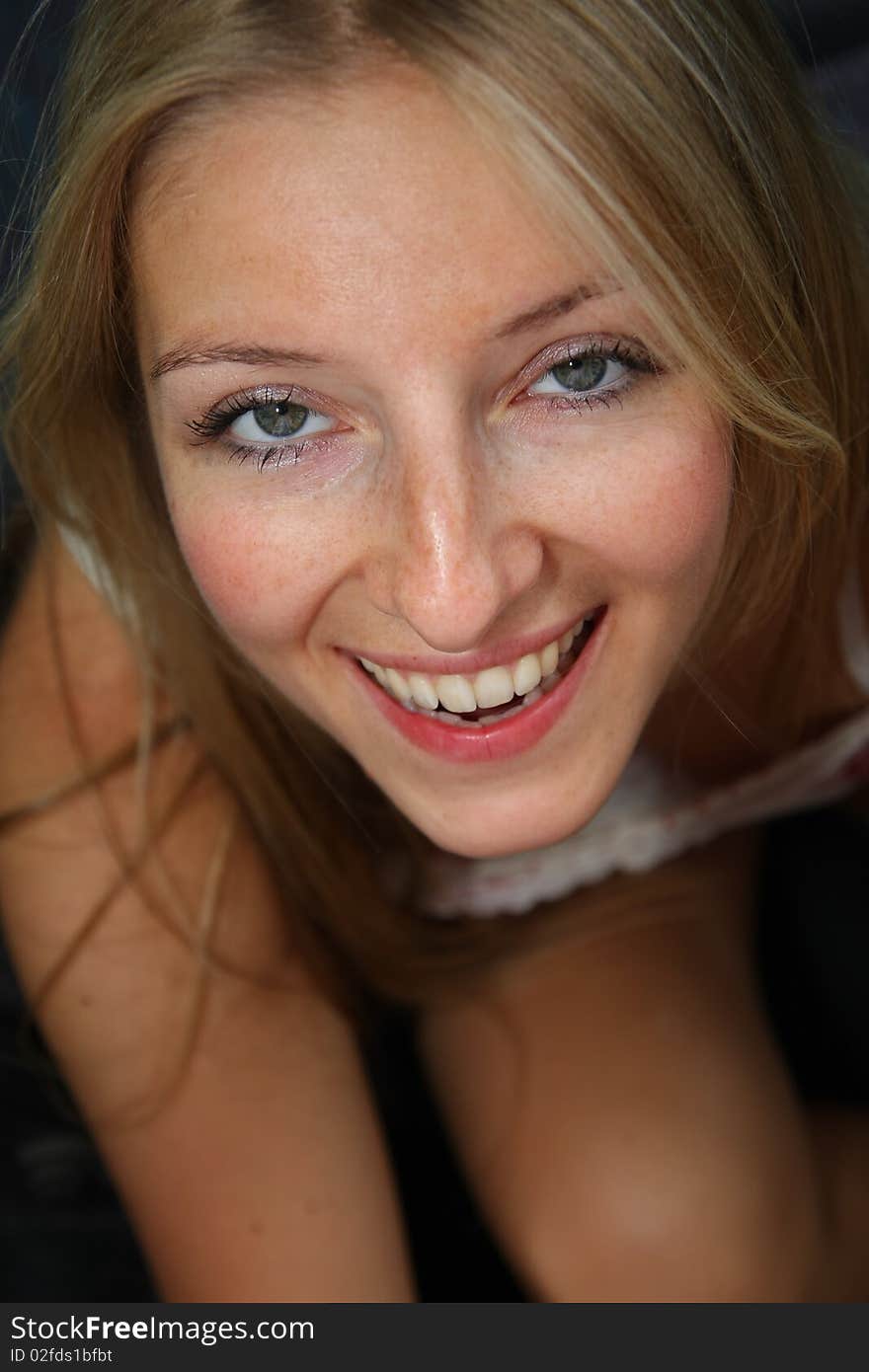 Smiling caucasian blond woman portrait