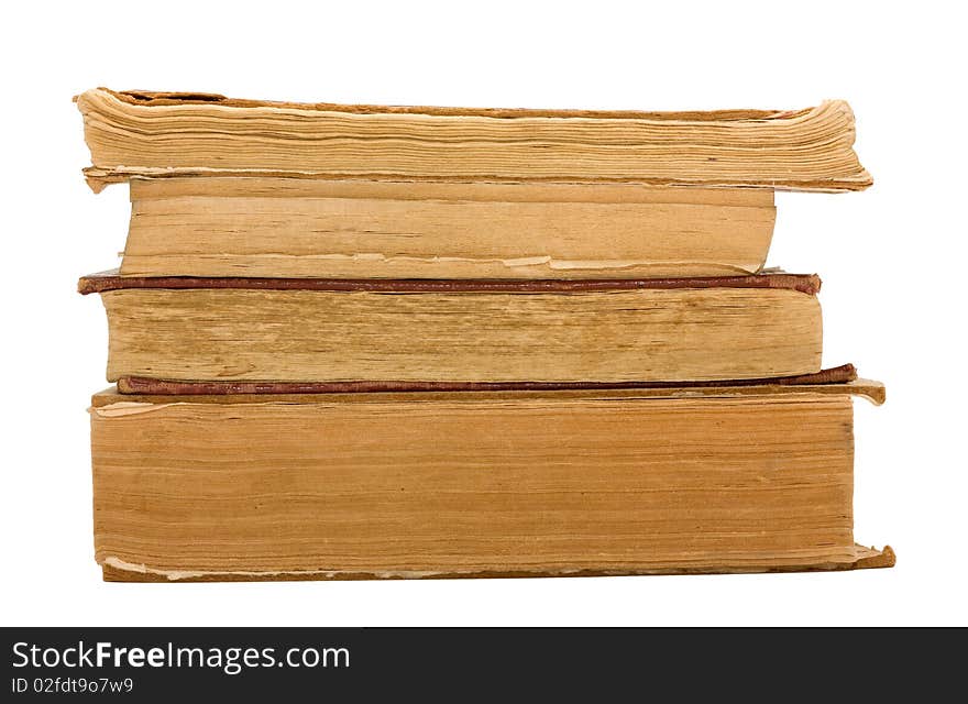 Old books in stack. Isolation.