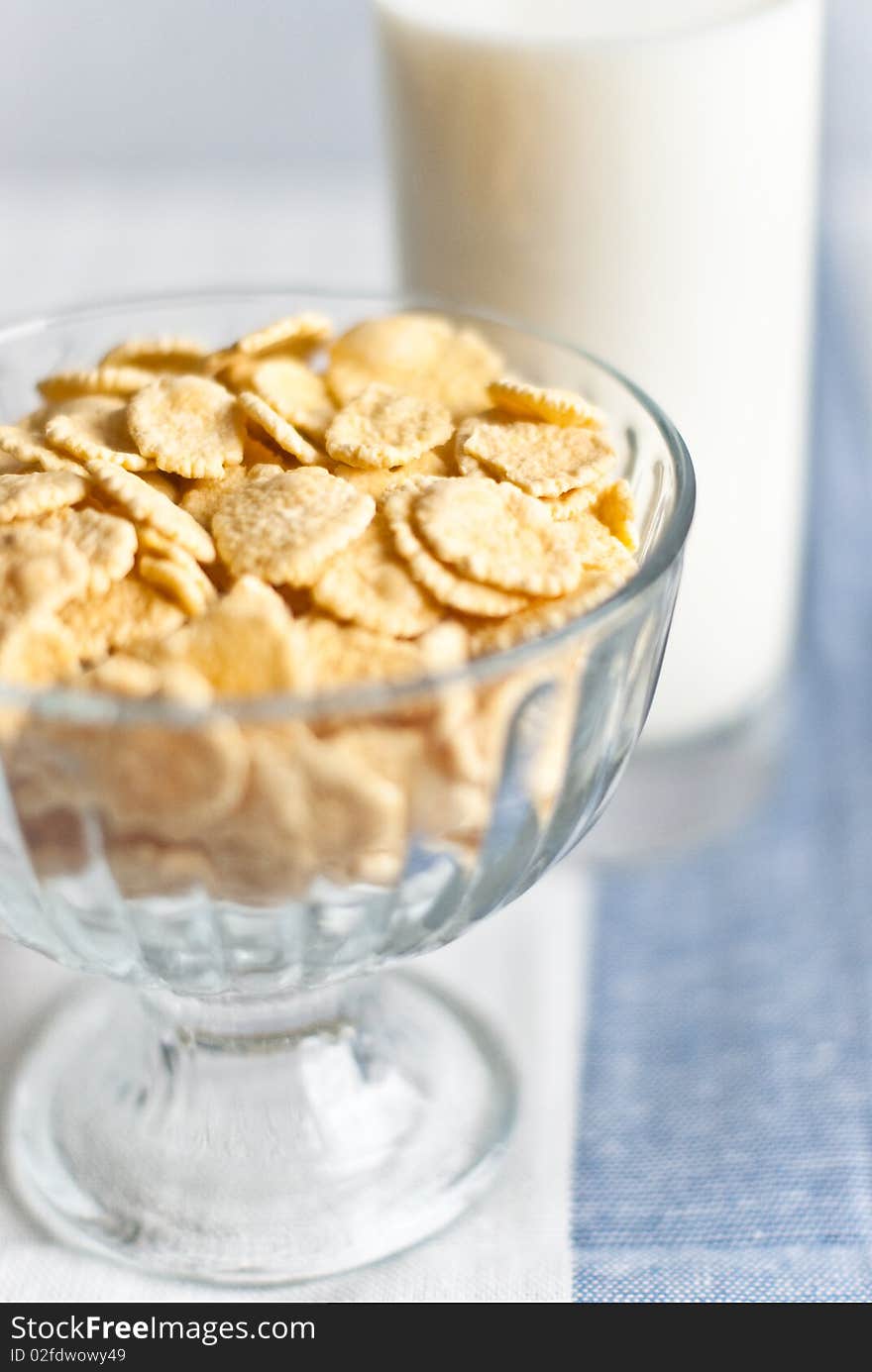 Cornflakes and glass of milk as morning meal