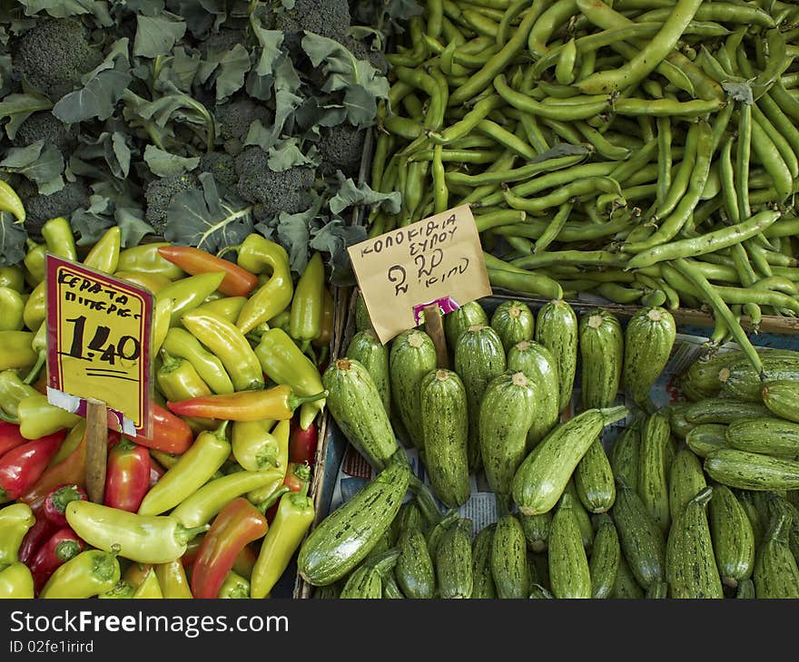 Earth treasures, a feast of fresh vegetables broccoli, green beans, peppers, zucchini