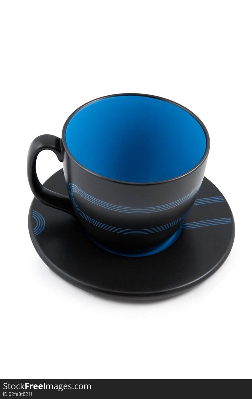 Big black and blue empty mug with saucer