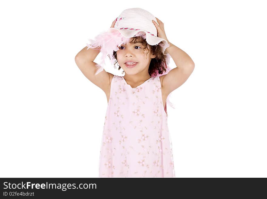 Little afro american girl holding a pink hat. Little afro american girl holding a pink hat