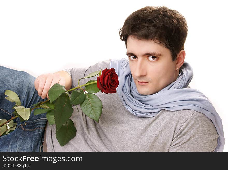 Young attractive smiling man with red rose on white background. Young attractive smiling man with red rose on white background