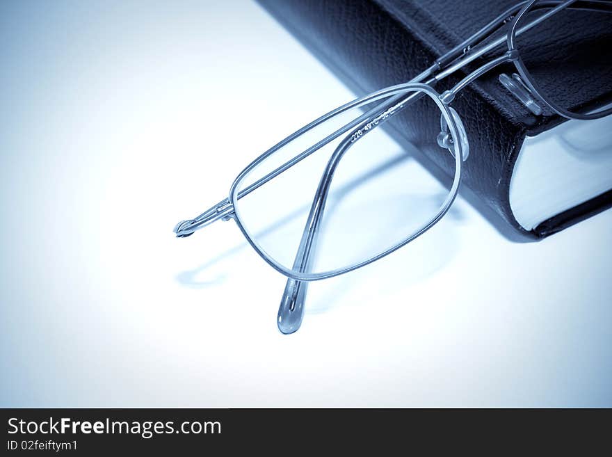 Book And Glasses