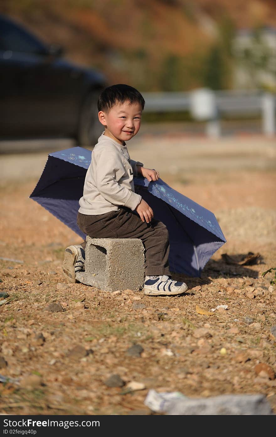 Asian boy and Umbrella